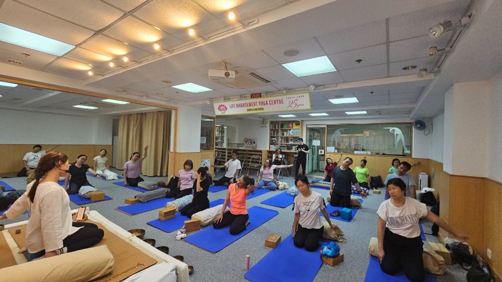 Group yoga class at Life Management Yoga Centre, Tsim Sha Tsui